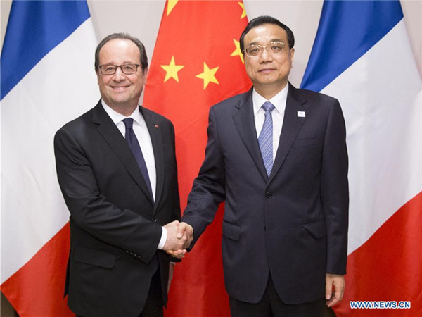 Chinese Premier Li Keqiang (R) meets with French President Francois Hollande in New York Sept. 20, 2016. (Xinhua/Huang Jingwen)