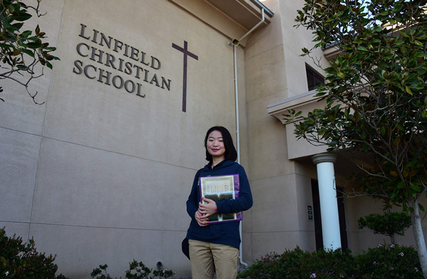 Helen Zhou Hailun, from Chengdu, poses on campus at Linfield Christian School in Temecula. She is part of the increasing wave of Chinese students attending U.S. schools and colleges. (Photo provided to China Daily)
