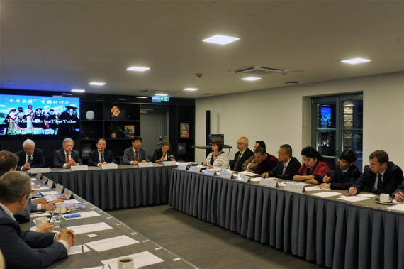 Members of a cultural exchange delegation from China's Tibet Autonomous Region attend a symposium in Riga, Latvia, Sept. 21, 2016. (Photo: Xinhua/Guo Qun)