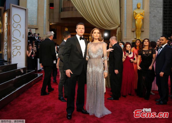 Hollywood actors Brad Pitt and Angelina Jolie at the Oscar Awards in Los Angeles, March 2, 2014. (Photo/Agencies)