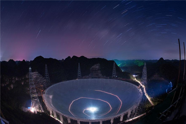 This scene shows the night view of the 500-meter Aperture Spherical Telescope in Pingtang county, Guizhou province, June 27, 2016. (Photo/Xinhua) 