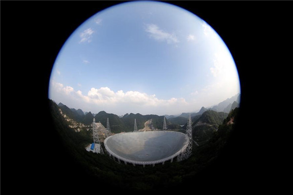 This scene taken from FAST's viewing platform shows the panorama of the 500-meter Aperture Spherical Telescope in Pingtang county, Guizhou province, Sept 24, 2016. (Photo/Xinhua)