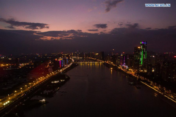 Photo taken on Sept. 26, 2016 shows the sunset view of above the Minjiang River in Fuzhou, China's southeast Fujian Province.  (Photo: Xinhua/Song Weiwei) 