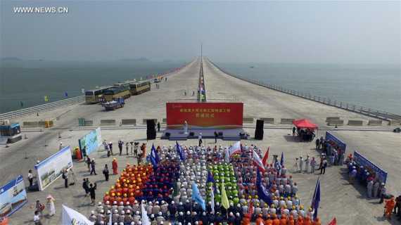 A ceremony celebrating completion of major construction work of the world's longest cross-sea bridge, which connects Zhuhai in south China's Guangdong Province with Hong Kong and Macao, is held in Zhuhai, Sept. 27, 2016. (Photo: Xinhua/Liang Xu)
