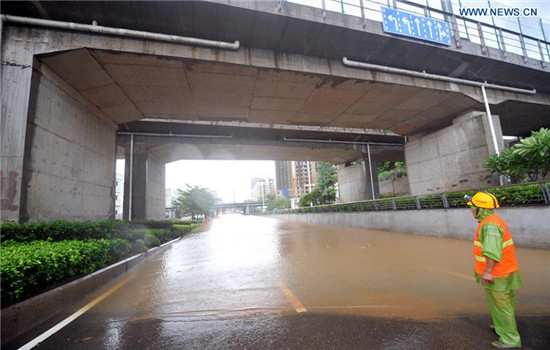A road is flooded in typhoon-hit Fuzhou, capital of southeast China's Fujian Province, Sept. 28, 2016. Typhoon Megi, the 17th typhoon this year, made landfall in Hui'an of Quanzhou city in Fujian in the early morning on Wednesday. (Photo: Xinhua/Peng Zhangqing) 