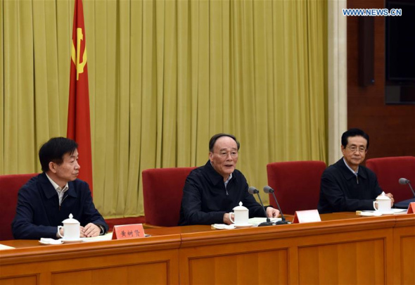Wang Qishan (C), secretary of the Communist Party of China Central Commission for Discipline Inspection, attends a symposium on anti-corruption inspections in Beijing, capital of China, Sept. 28, 2016. (Photo: Xinhua/Rao Aimin) 