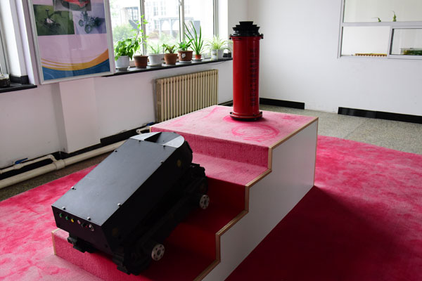 The photo shows a model of fire extinguishing and explosion proof intelligent robot (system), in Fushun, Northeast China's Liaoning province, Sept 27, 2016. (Photo by Wu Yan/chinadaily.com.cn)