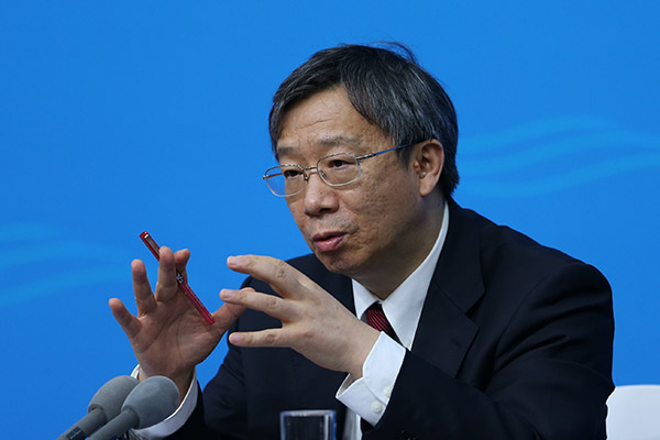 Yi Gang, vice-governor of People's Bank of China, answers questions on a press conference on Sept 2, 2016, prior to the G20 Leaders Summit to be held in Hangzhou, Zhejiang province. (Photo/China Daily)
