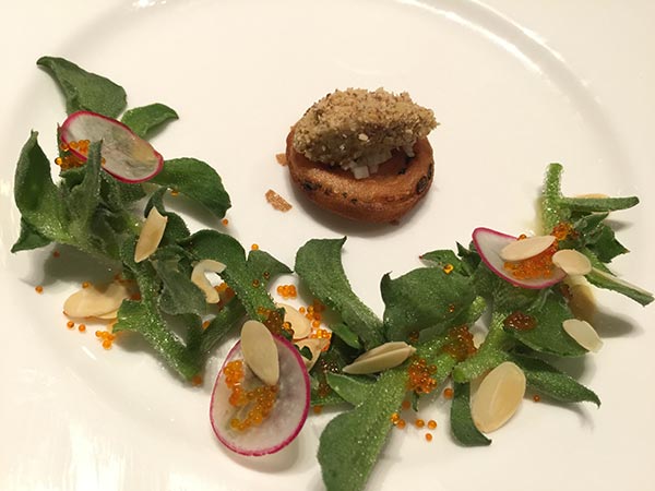 Almond slices and green vegetable salad with goose-liver pate. (Photo provided to China Daily)
