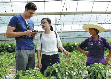 Adam Hegarty, during an interview at a vegetable greenhouse in Xingguo county, Jiangxi province. Liu Zhiqiang / For China Daily