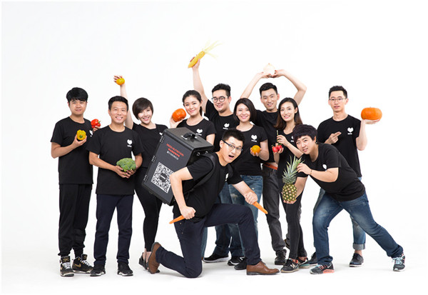 Staff members from food delivery service Need Nutrition in Beijing gather for a promotional image for healthy eating.(Photo provided to China Daily)