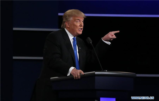 Republican Donald Trump speaks during the first presidential debate with Democrat Hillary Clinton at Hofstra University in Hempstead of New York, the United States, Sept. 26, 2016. Donald Trump and Hillary Clinton on Monday held their first presidential debate in Hempstead. (Xinhua/Qin Lang)