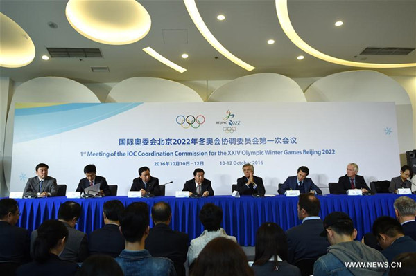 Participants from IOC Coordination Commission and the Beijing Organizing Committee for the 2022 Olympic and Paralympic Winter Games attend the press conference for the 1st Meeting of the IOC Coordination Commission for the XXIV Olympic Winter Games Beijing 2022 in Beijing, capital of China, Oct. 12, 2016. (Photo/Xinhua)