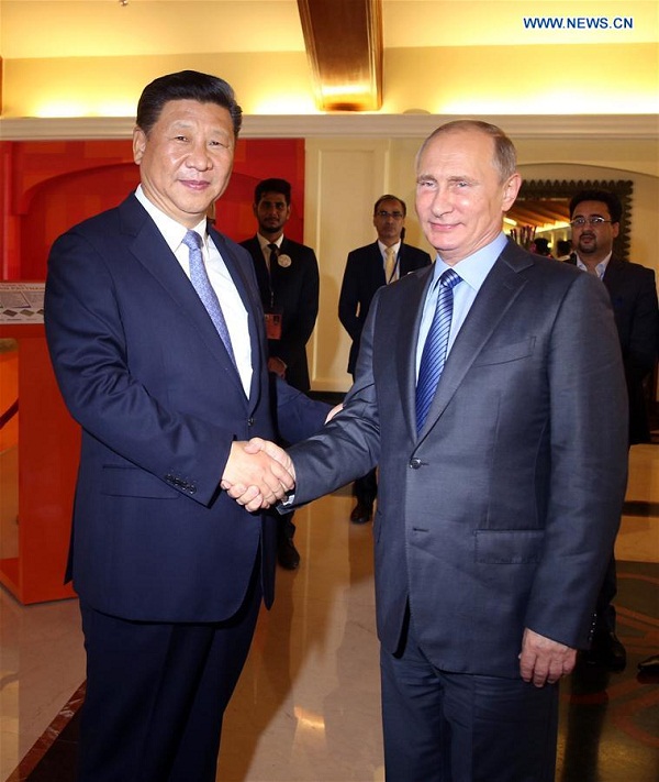 Chinese President Xi Jinping meets with Russian President Vladimir Putin in the western Indian state of Goa, Oct. 15, 2016. (Xinhua/Yao Dawei)