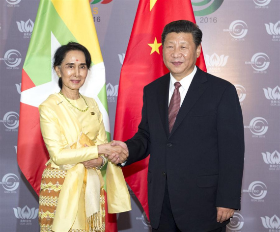 Chinese President Xi Jinping meets with Myanmar's State Counsellor Aung San Suu Kyi in the western Indian state of Goa, Oct. 16, 2016. (Photo: Xinhua/Wang Ye)