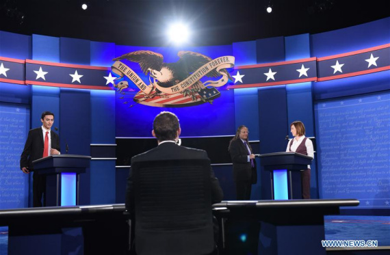 TV staff rehearse live broadcasting for the Final Presidential Debate at the University of Nevada Las Vegas (UNLV) in Las Vegas, Nevada, the United States, Oct. 19, 2016.  (Photo: Xinhua/Yin Bogu)