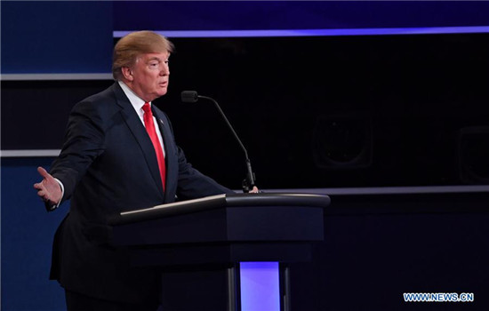 Republican presidential candidate Donald Trump participates in the third and final presidential debate at the University of Nevada Las Vegas (UNLV) in Las Vegas, Nevada, the United States, Oct.19, 2016.(Xinhua/Yin Bogu)
