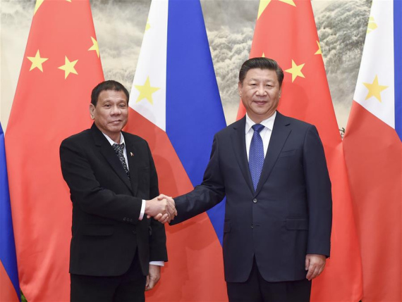 Chinese President Xi Jinping (R) holds talks with his Philippine counterpart Rodrigo Duterte in Beijing, capital of China, Oct. 20, 2016. (Photo: Xinhua/Li Xueren)