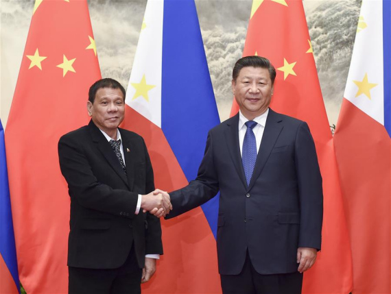 Chinese President Xi Jinping (R) holds talks with his Philippine counterpart Rodrigo Duterte in Beijing, capital of China, Oct. 20, 2016. (Photo: Xinhua/Li Xueren)