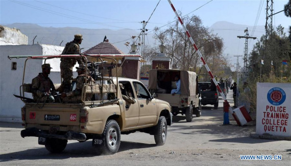 Pakistani soldiers enter the Police Training College following attack in southwest Pakistan's Quetta on Oct. 25, 2016. At least 60 people were killed and 117 others injured when three armed men attacked a police training center in Pakistan's southwest Quetta city, officials said Tuesday. (Photo: Xinhua/Asad)