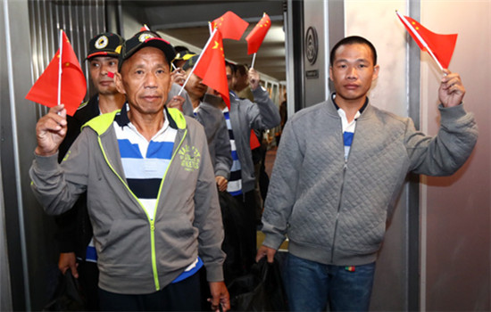 Nine Chinese sailors released by pirates arrive at Baiyun International Airport in Guangzhou on Oct 25, 2016. (Photo/provided to China Daily)