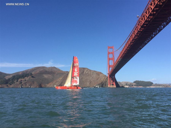 File Photo taken on Oct. 18, 2016 shows Chinese mariner Guo Chuan sailing his trimaran under San Francisco's Golden Gate Bridge, the United States. (Photo/Xinhua)