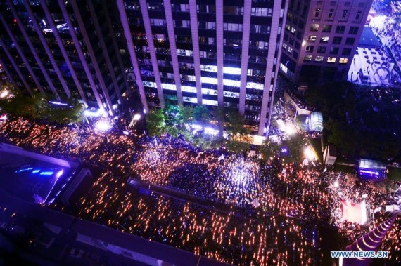  People attend a rally asking for the resignation of South Korean President Park Geun-hye in Seoul, South Korea, Oct. 29, 2016. (Photo: Xinhua/Newsis)