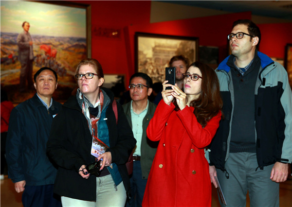 Aniseh Abdall from Jordan, now studying in Tsinghua University for post-doctorate degree, visits the Long March exhibit at the China People's Revolution Military Museum. (Photo by ZOU HONG/CHINA DAILY)