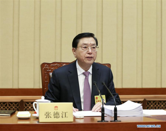 Zhang Dejiang, chairman of the Standing Committee of China's National People's Congress (NPC), presides over the 1st plenary meeting of the 24th session of the 12th NPC Standing Committee in Beijing, capital of China, Oct. 31, 2016. (Photo: Xinhua/Pang Xinglei)