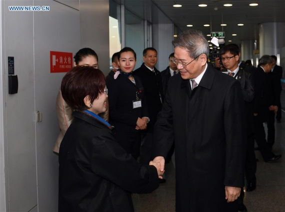 Hung Hsiu-chu (L), leader of Taiwan's Kuomintang Party (KMT), is received by Zhang Zhijun (R), head of the Taiwan Work Office of the Communist Party of China Central Committee, after her arrival at the Beijing Capital International Airport in Beijing, capital of China, Oct. 31, 2016. (Photo: Xinhua/Chen Yehua)