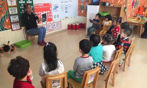 Sixto Julio Piso, a Filipino English teacher gives a class at the Beanstalk International School. (Photo/Courtesy of Sixto Julio Piso)