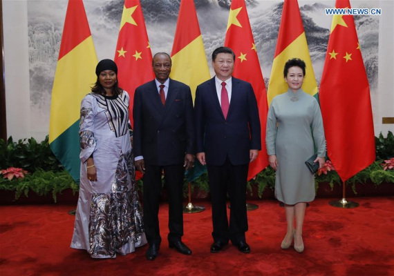 Chinese President Xi Jinping (2nd R) and his wife Peng Liyuan (1st R) pose for a photo with Guinean President Alpha Conde (2nd L) and his wife Djene Kaba Conde in Beijing, capital of China, Nov. 2, 2016. Xi Jinping held talks with Alpha Conde on Wednesday. (Photo: Xinhua/Ju Peng) 