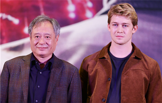 Lee and British actor Joe Alwyn at another Beijing event. (FENG YONGBIN/CHINA DAILY)