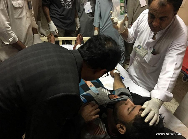 A man injured in a bomb blast at a shrine, receives medical treatment at a hospital in Hub town, southwest Pakistan, on Nov. 12, 2016. At least 40 people were killed and over 100 others injured after a suicide blast hit a shrine in Pakistan's southwest Balochistan district on Saturday night, local media and officials said. (Xinhua/Stringer)