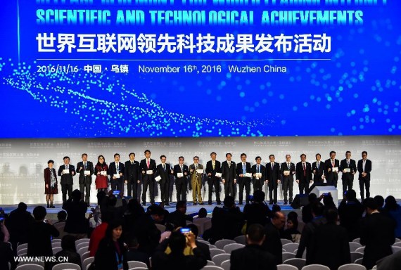 Representatives attending a release ceremony of world leading internet scientificand technological achievements pose for a group photo at the 3rd World Internet Conference in Wuzhen, east China's Zhejiang Province, Nov. 16, 2016. (Photo Xinhua/Xu Yu)