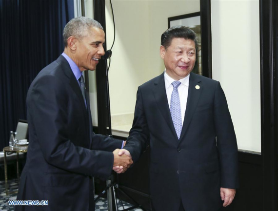 Chinese PresidentXi Jinping(R) meets with his U.S. counterpartBarack Obamain Lima, Peru, Nov. 19, 2016. (Photo: Xinhua/Lan Hongguang)