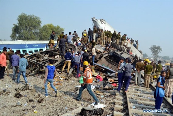 Rescue forces work at a train accident site near Kanpur in Uttar Pradesh, India, Nov. 20, 2016. (Photo/Xinhua)