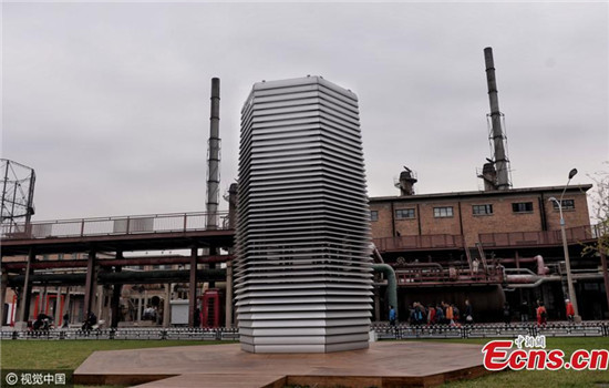 A Smog Free Tower by Dutch designer Daan Roosegaarde undergoes tests in Beijing, Oct. 20, 2016. The seven-meter-high metal structure is said to be the world's largest air purifier with the capacity to scrub 30,000 cubic meters of air an hour. (Photo/CFP)