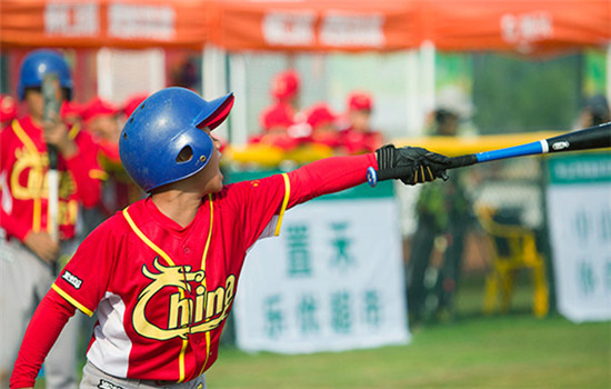A Chinese U12 baseball player reacts during the Panda Cup, which is held in November in Zhongshan, South China's Guangdong province. (Photo provided to chinadaily.com.cn)