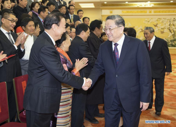 Yu Zhengsheng, chairman of the National Committee of the Chinese People's Political Consultative Conference (CPPCC), meets with representatives of the third congress of the China Association for the Preservation and Development of Tibetan Culture in Beijing, capital of China, Nov. 23, 2016. (Photo: Xinhua/Xie Huanchi)