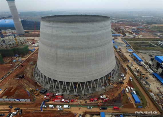 Aerial photo taken on Nov. 24, 2016 shows the accident site at the Fengcheng power plant in Yichun City, east China's Jiangxi Province. Sixty-seven people have been confirmed dead and another missing as a platform of a power plant's cooling tower under construction collapsed in Jiangxi Thursday, rescuers said. (Photo: Xinhua/Wan Xiang)