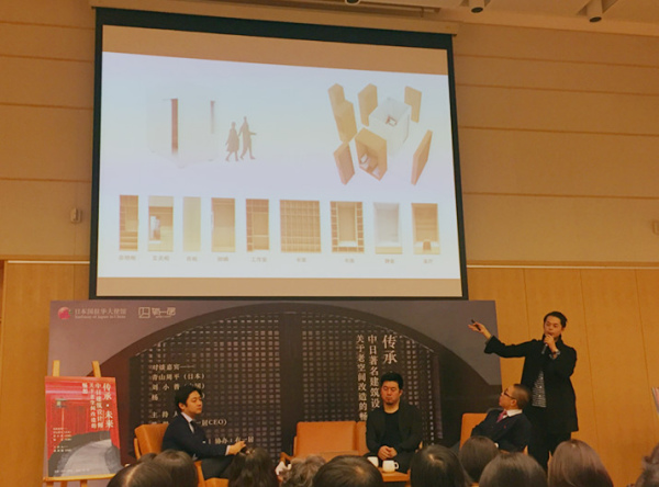 Shuhei Aoyama explains the structure of a "box" in his "400 Boxes Community" plan. (Photo: Ecns.cn/Wang Fan) 