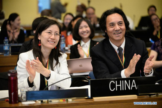 Chinese representatives celebrate as China's The Twenty-Four Solar Terms is inscribed on the Representative List of the Intangible Heritage of Humanity during the 11th session of the UN Educational, Scientific and Cultural Organization's (UNESCO) Intergovernmental Committee for the Safeguarding of the Intangible Cultural Heritages in Addis Ababa, Ethiopia, Nov. 30, 2016. (Xinhua/Michael Tewelde)