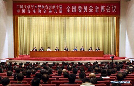 Liu Yunshan (C, rear), a member of the Standing Committee of the Political Bureau of the Communist Party of China (CPC) Central Committee and the Secretariat of the CPC Central Committee, attends the plenary session of the 10th Congress of the China Federation of Literary and Art Circles (CFLAC) and the ninth Congress of the Chinese Writers Association (CWA), in Beijing, capital of China, Dec. 3, 2016. (Photo/Xinhua)