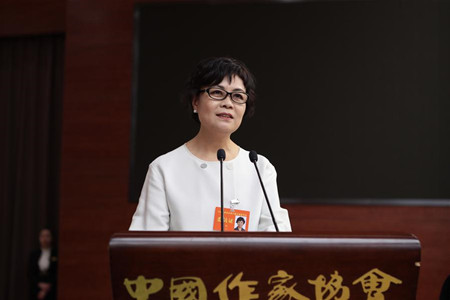 Tie Ning, the reelected chairwoman of the Chinese Writers Association (CWA), speaks during the closing ceremony of the ninth Congress of the CWA in Beijing, capital of China, Dec. 3, 2016. (Xinhua/Wang Jiguo)