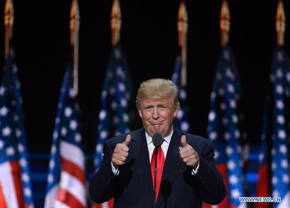 File photo taken on July 21, 2016 shows Donald Trump taking the stage on the last day of the Republican National Convention in Cleveland, Ohio, the United States. (Photo: Xinhua/Yin Bogu)