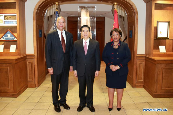 China's State Councilor and Minister of Public Security Guo Shengkun (C), U.S. Attorney General Loretta Lynch (R) and Secretary of Homeland Security Jeh Johnson pose for a group photo in Washington, the United States, Dec. 7, 2016. The third China-U.S. ministerial dialogue on fighting cyber crimes was held here Wednesday. (Photo/Xinhua)