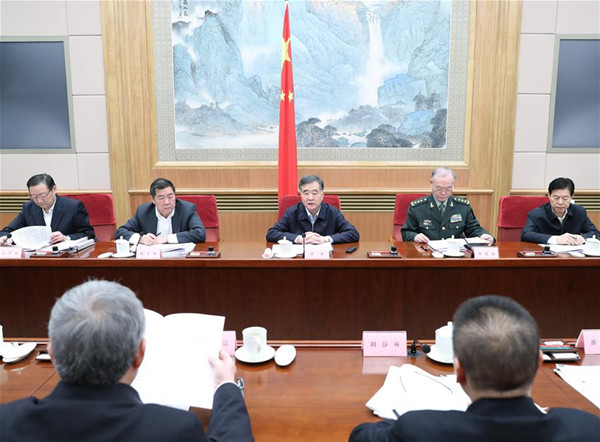 Chinese Vice Premier Wang Yang (C), who is also head of the State Council Leading Group of Poverty Alleviation and Development, attends a plenary session of the leading group in Beijing, capital of China, Dec. 12, 2016. (Xinhua/Wang Ye)