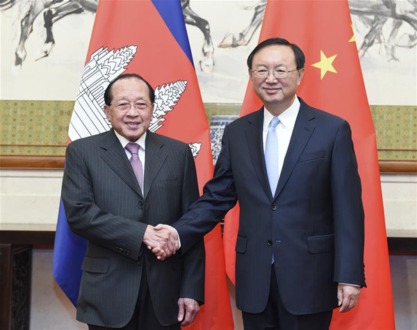 Chinese State Councilor Yang Jiechi (R) meets with Cambodian Deputy Prime Minister Hor Namhong in Beijing, capital of China, Dec. 15, 2016. (Xinhua/Zhang Ling)