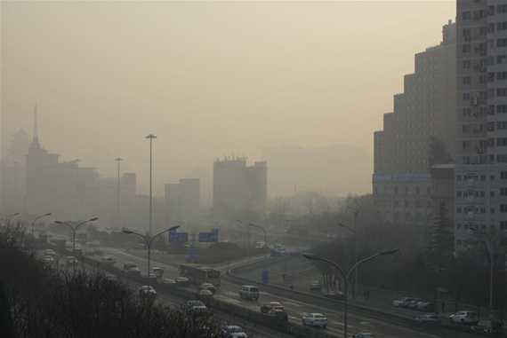 Photo taken on Dec. 19, 2016 shows the city view of Beijing shrouded in smog in the capital of China. Severe smog continued to shroud northern China and even worsened late Monday, disrupting life in dozens of cities. (Photo/Xinhua)